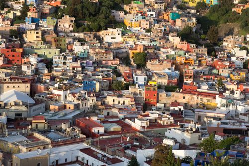 Free Vibrant aerial perspective of Guanajuato's colorful houses and architecture. Stock Photo