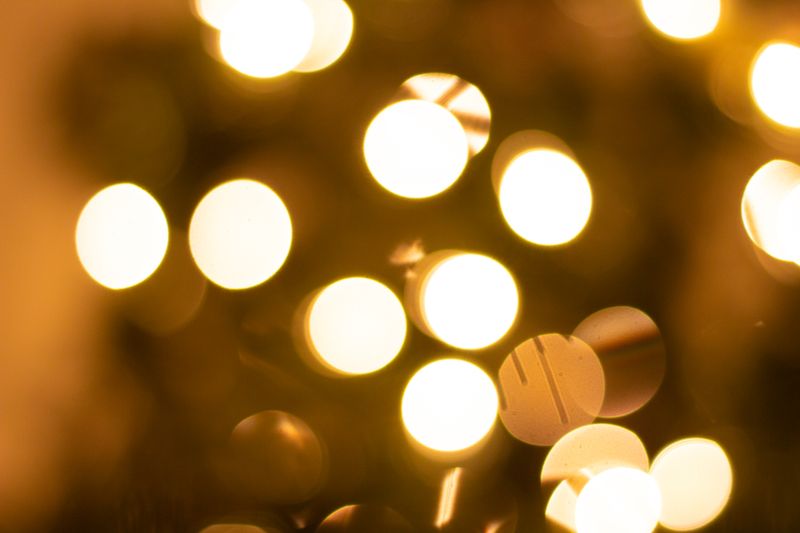 Warm golden bokeh lights — photo by Opti Media on Pexels