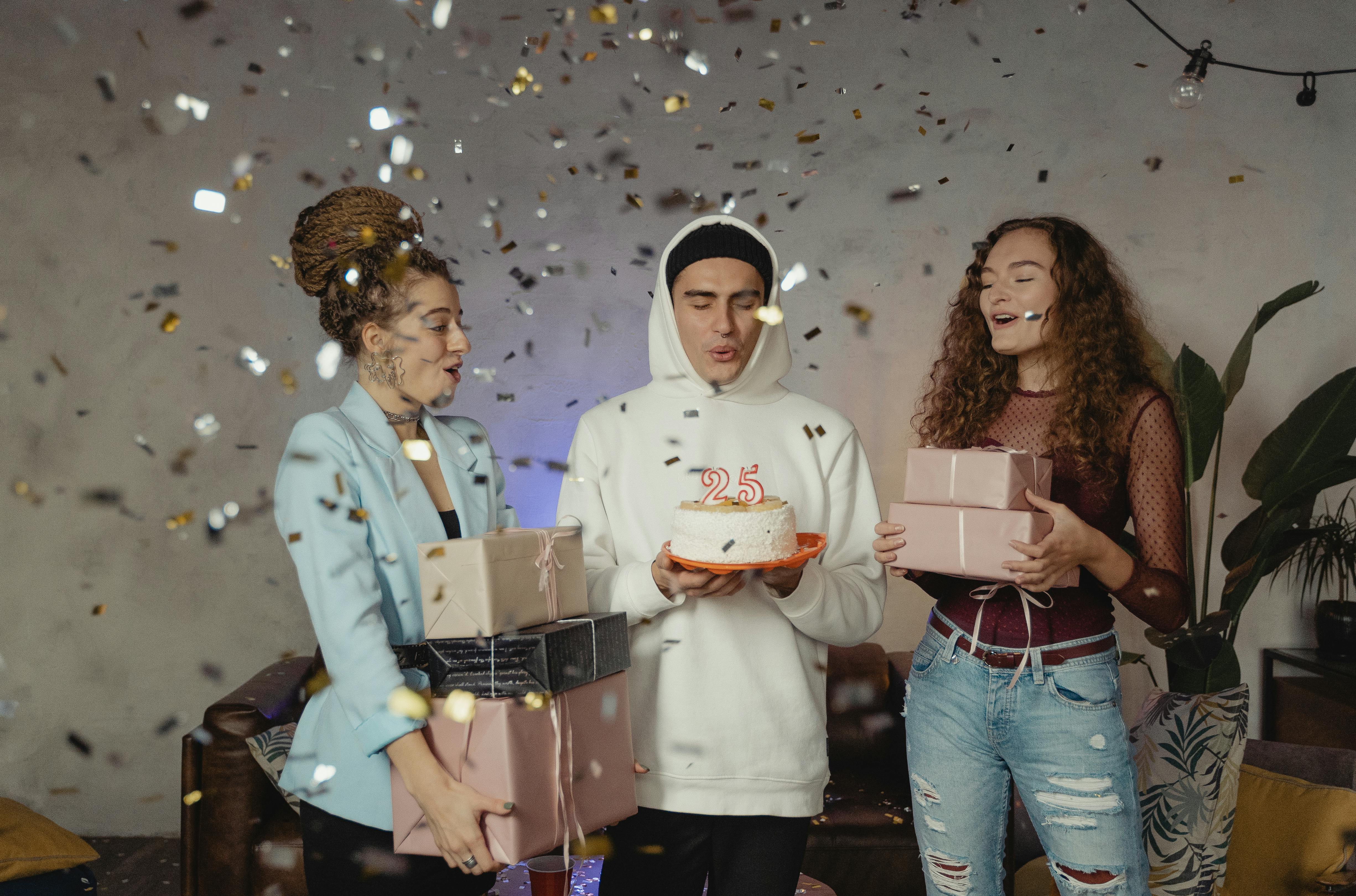 group of young people having a birthday celebration