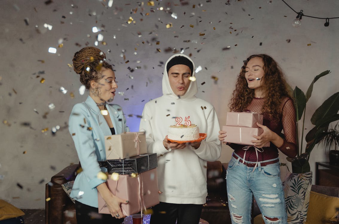 Free Group of Young People having a Birthday Celebration Stock Photo