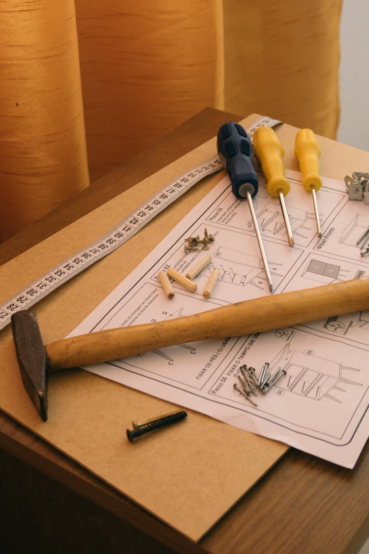 Hammer, Screwdrivers And Furniture Assembly Instructions