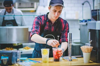 Man Holding Drinking Glass