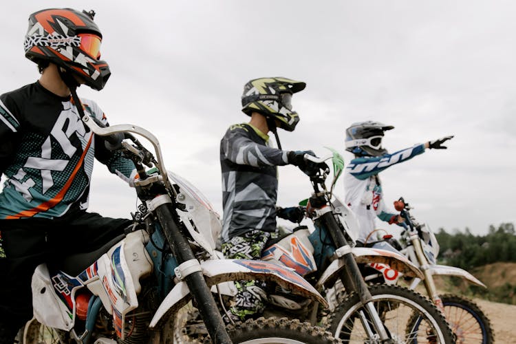 Men Riding Dirt Bikes Together