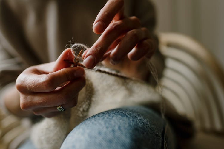 Close Up Of A Person Crocheting