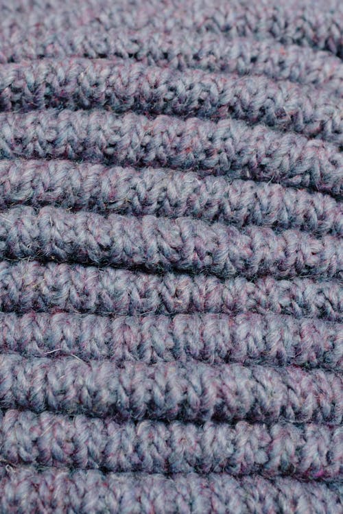 Free Close-Up Shot of a Gray Knitted Textile Stock Photo