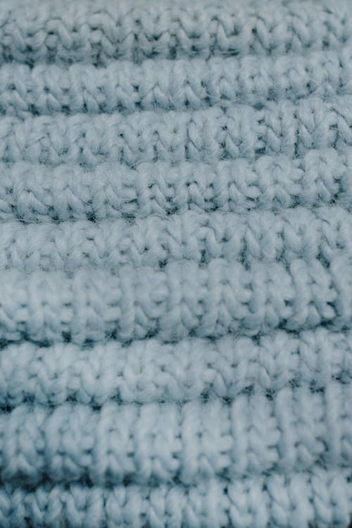 Close-Up Shot of a Gray Knitted Textile