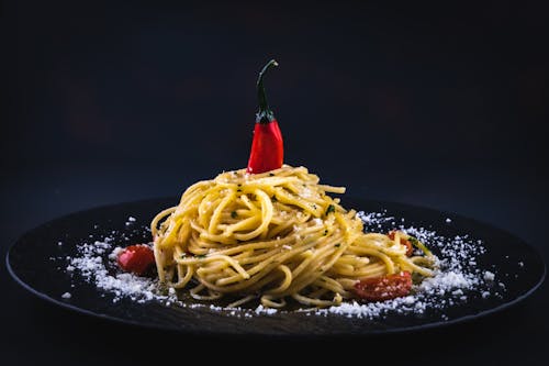 Free Pasta with Red Chillies on Top  Stock Photo