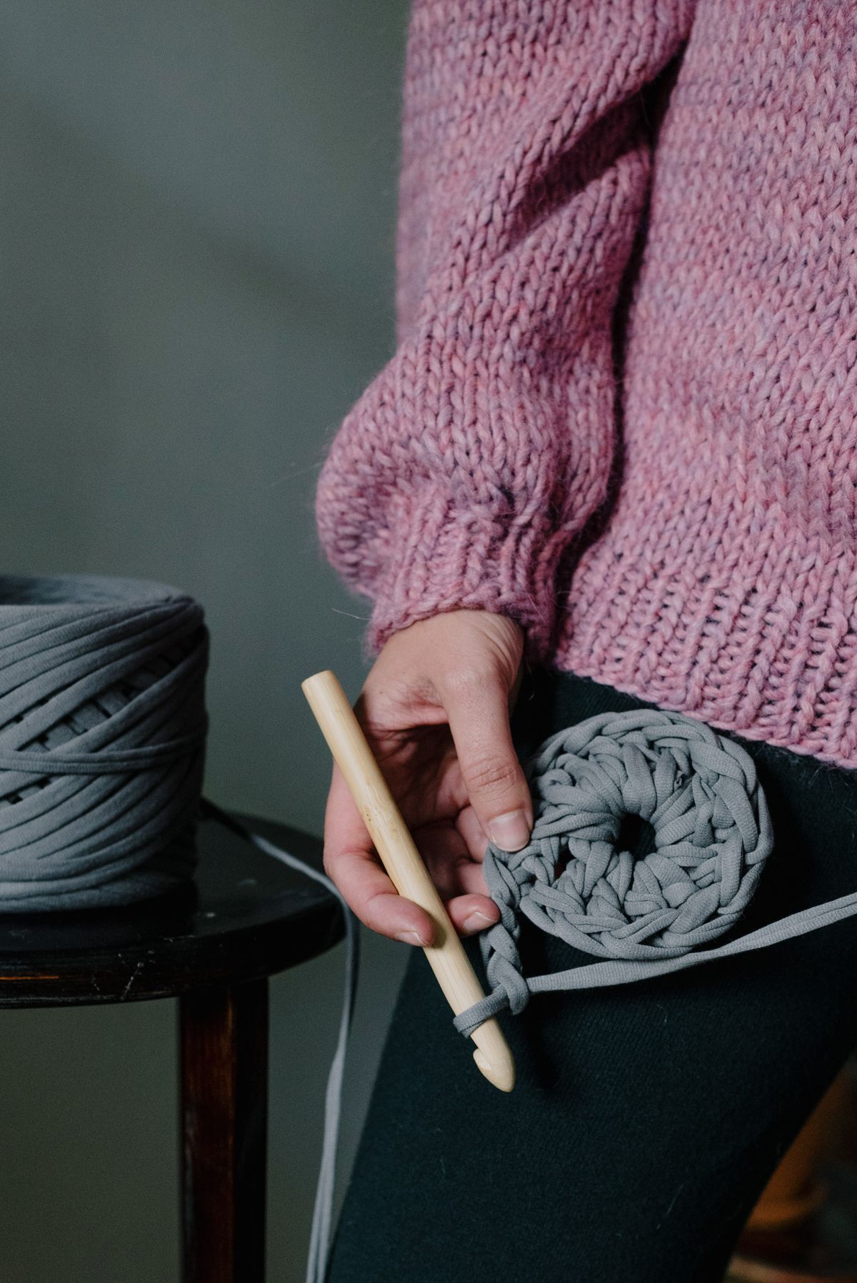 Woman creating handmade crochet