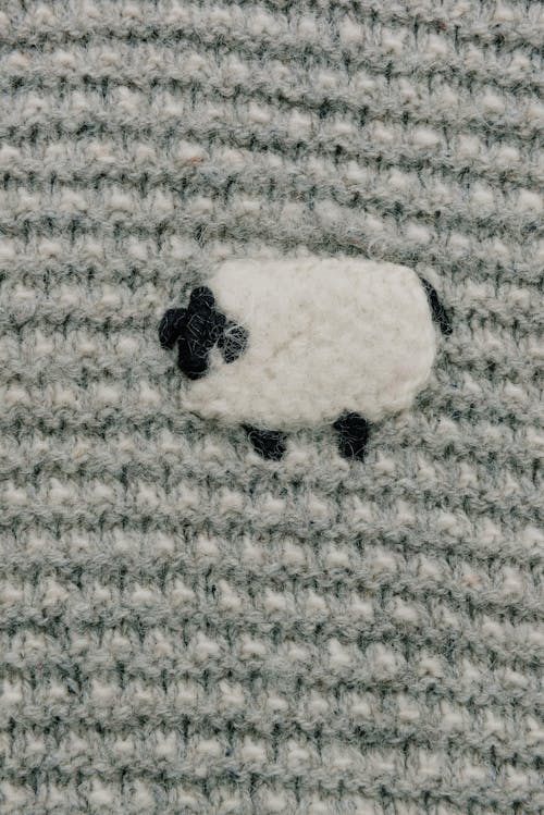 Knitted Sheep on a Sweater