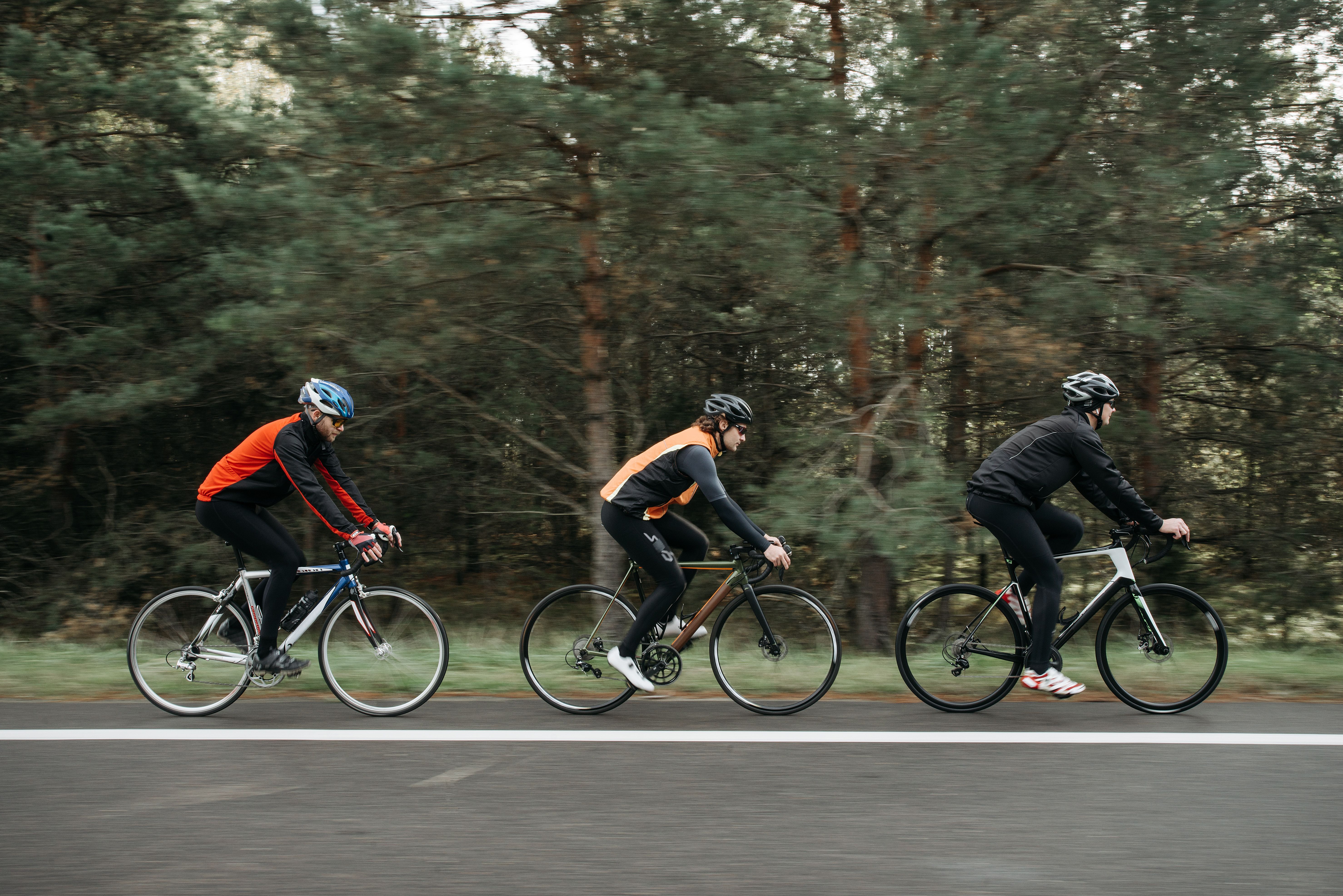 Men Riding Bicycles on the Road · Free Stock Photo