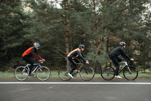 Men Riding Bicycles on the Road