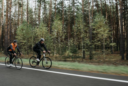 Men Riding Bicycles on the Road