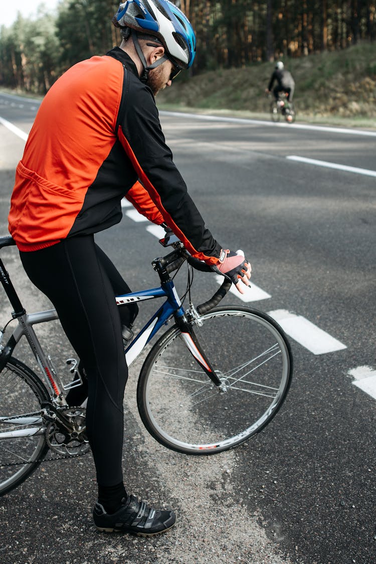 A Man Riding A Bicycle