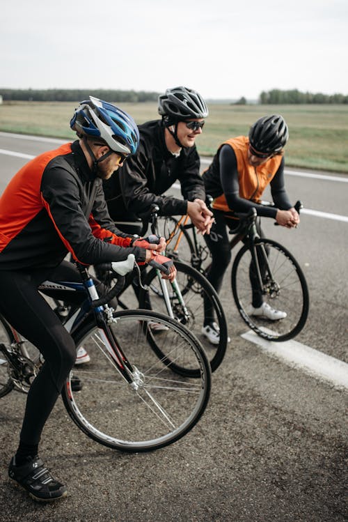 Cyclists resting on Road