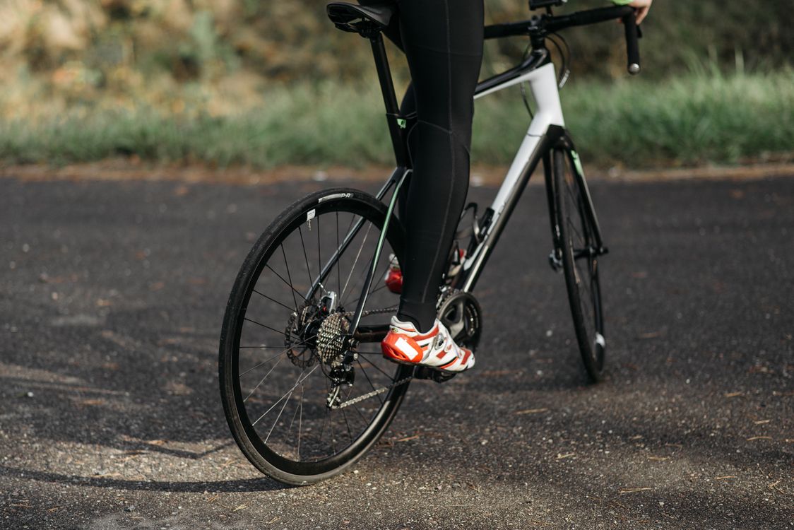 Biker riding a Road Bike · Free Stock Photo