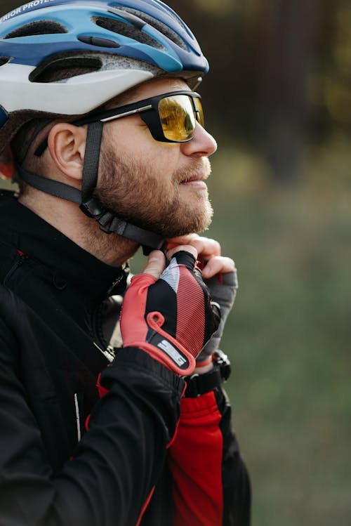 Man putting Protective Helmet on his Head