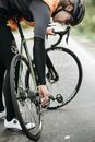 Person in Black Shorts Riding on Black Bicycle