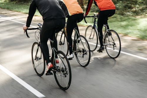 Free People Riding a Bicycle Stock Photo