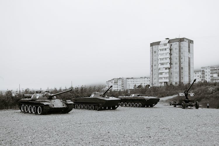 Old Military Tanks On Ground In City