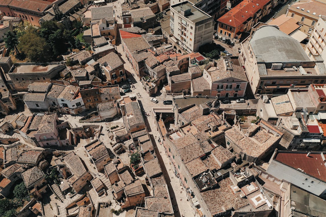 Aerial view of aged stone residential houses located in living district of old town