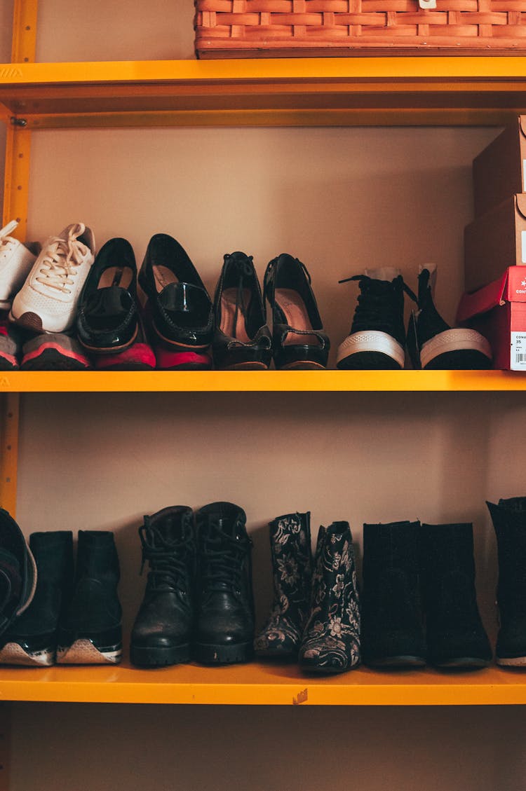 Shoe Rack With Many Pairs Of Shoes