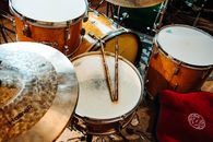 Brown and White Drum Set