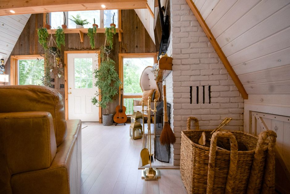 A warm and inviting rustic interior featuring natural light and wooden decor.