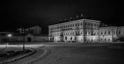 Aged classy building with illumination at night