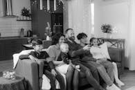Monochrome Photo of Happy Family sitting Together