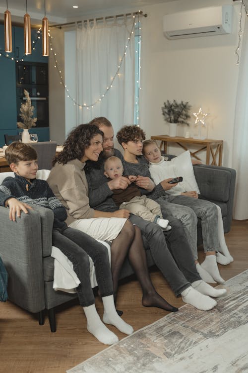 Screen time: family watching television together