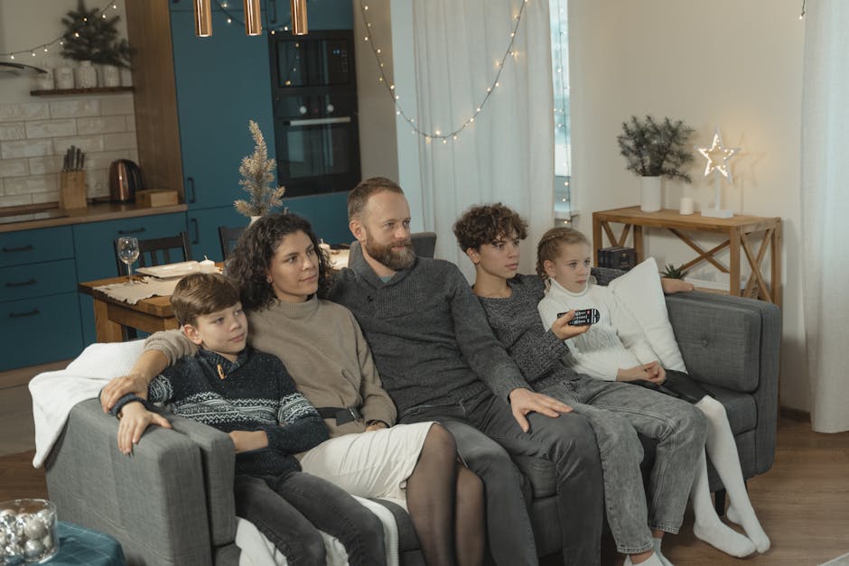A cozy family relaxing in their warm home during an Indiana winter - "I'm looking for quotes on a budget-friendly furnace replacement in the Greenville, Indiana area." A cozy family relaxing in their warm home during an Indiana winter - "I'm looking for quotes on a budget-friendly furnace replacement in the Greenville, Indiana area."
