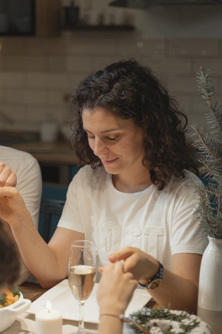 A Woman Leading A Thanksgiving Prayer