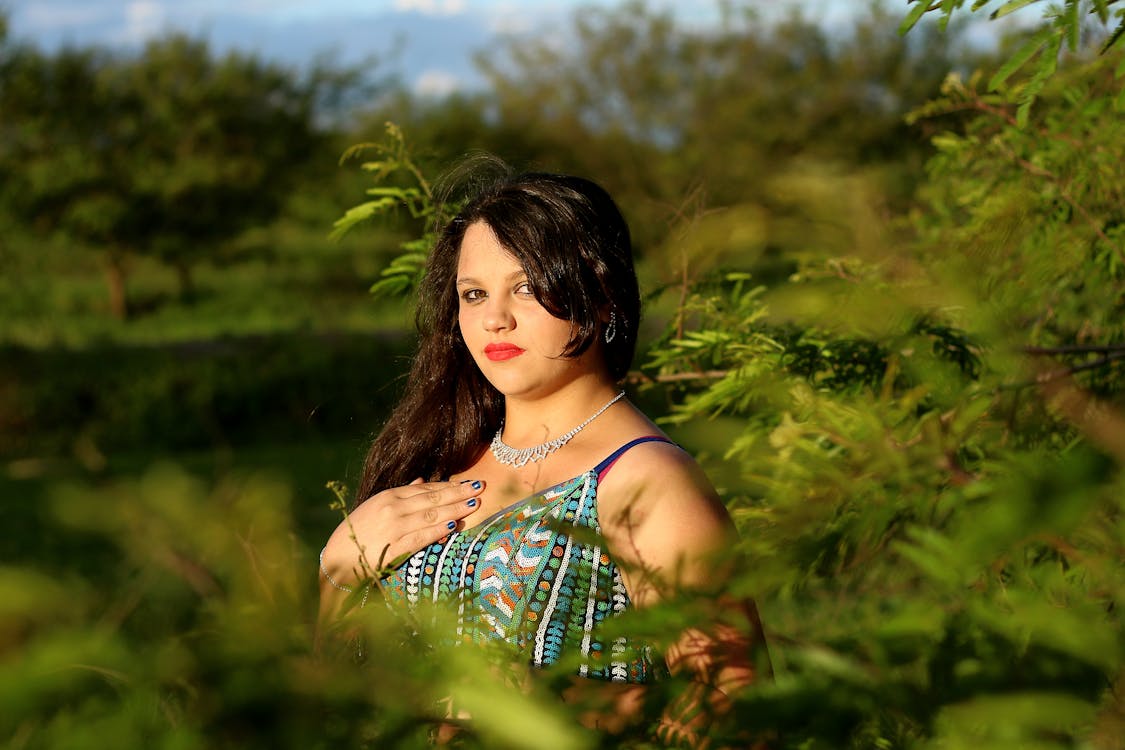 Free A Woman in Printed Sleeveless Dress Stock Photo