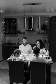 A happy family sharing a Christmas dinner together in a cozy home setting.
