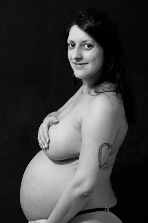 Free Grayscale Photo of Topless Pregnant Woman  Stock Photo
