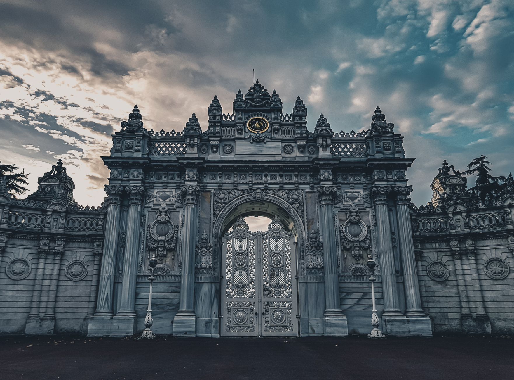 Majestic entrance with intricate designs at Dolmabahçe Palace, Istanbul.