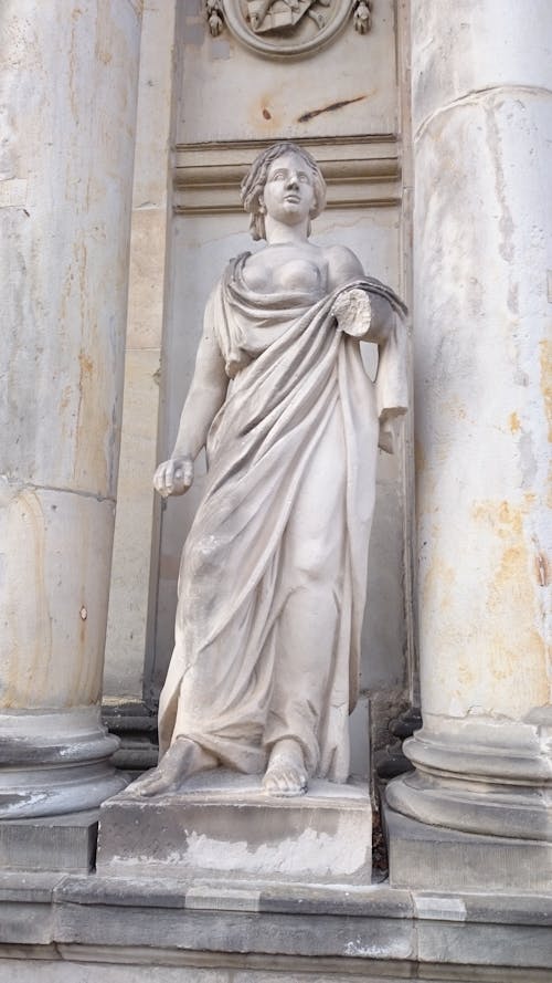 Free Marble Statue Of A Woman  Draped With Cloth Stock Photo
