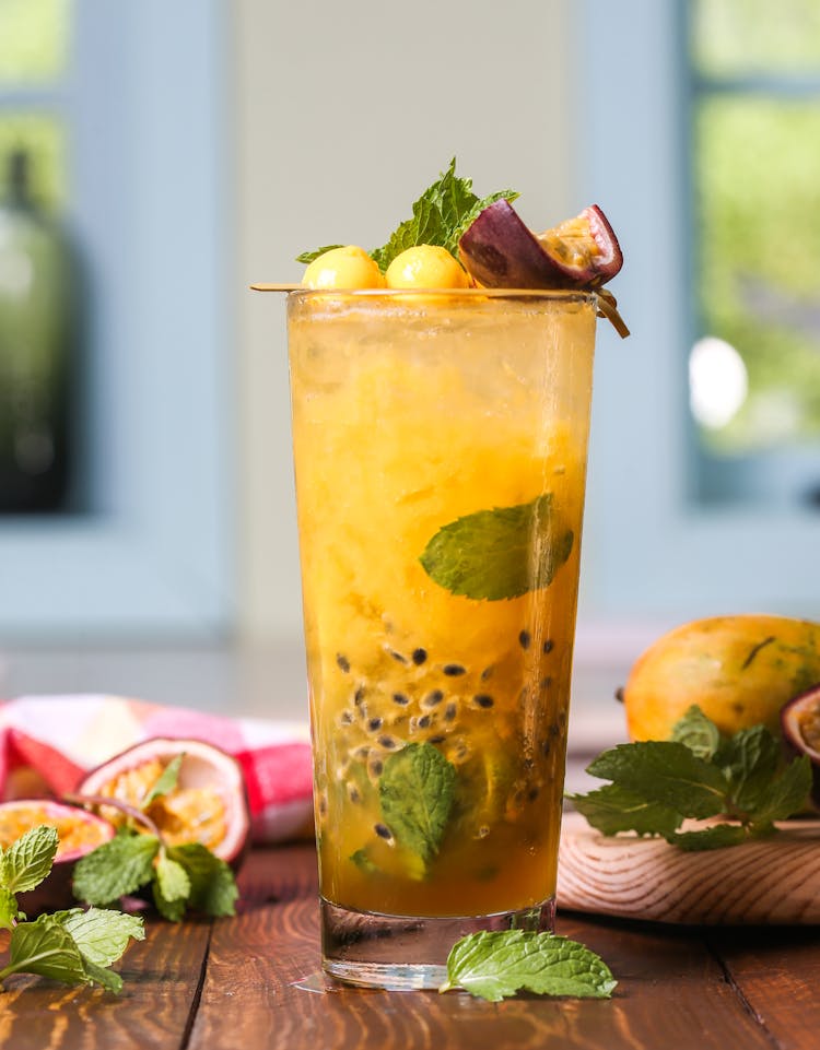 Fruity Juice With Mint Leaves And Sliced Lemon