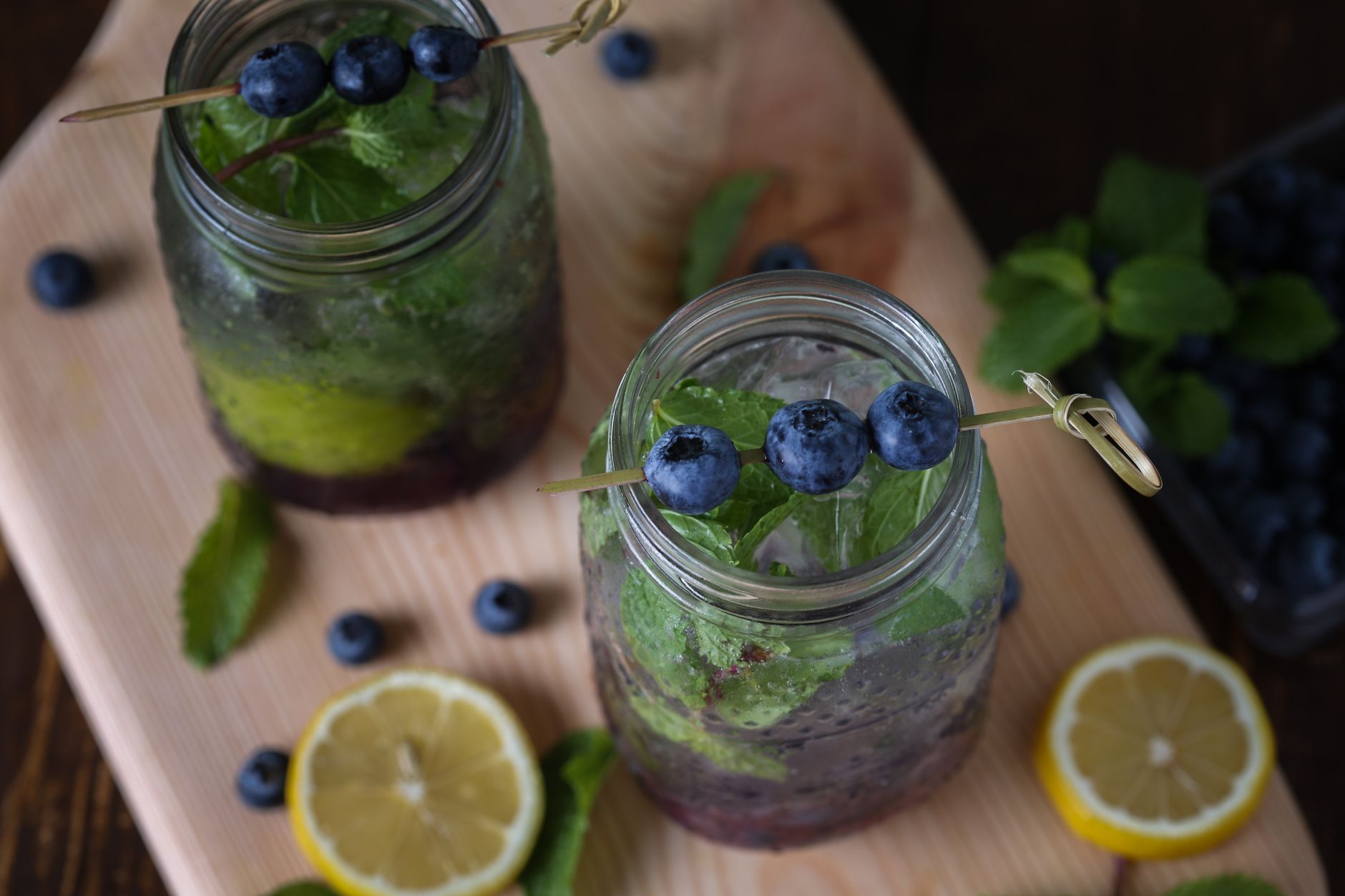Close-up of spiked lemonade with ice and mint