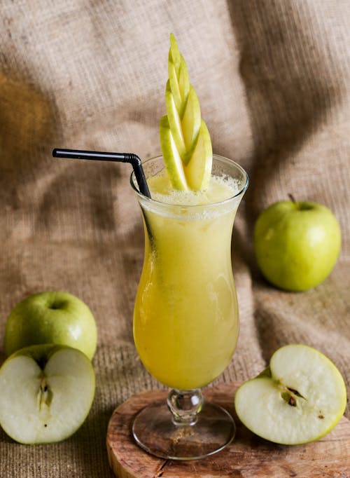 Close Up of Cold Apple Drink in Glass