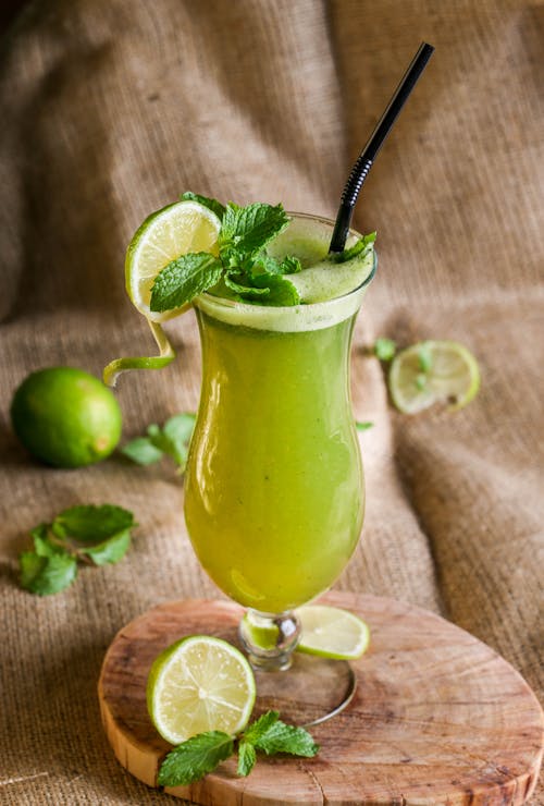 Green Fruit Juice with Slice of Lime