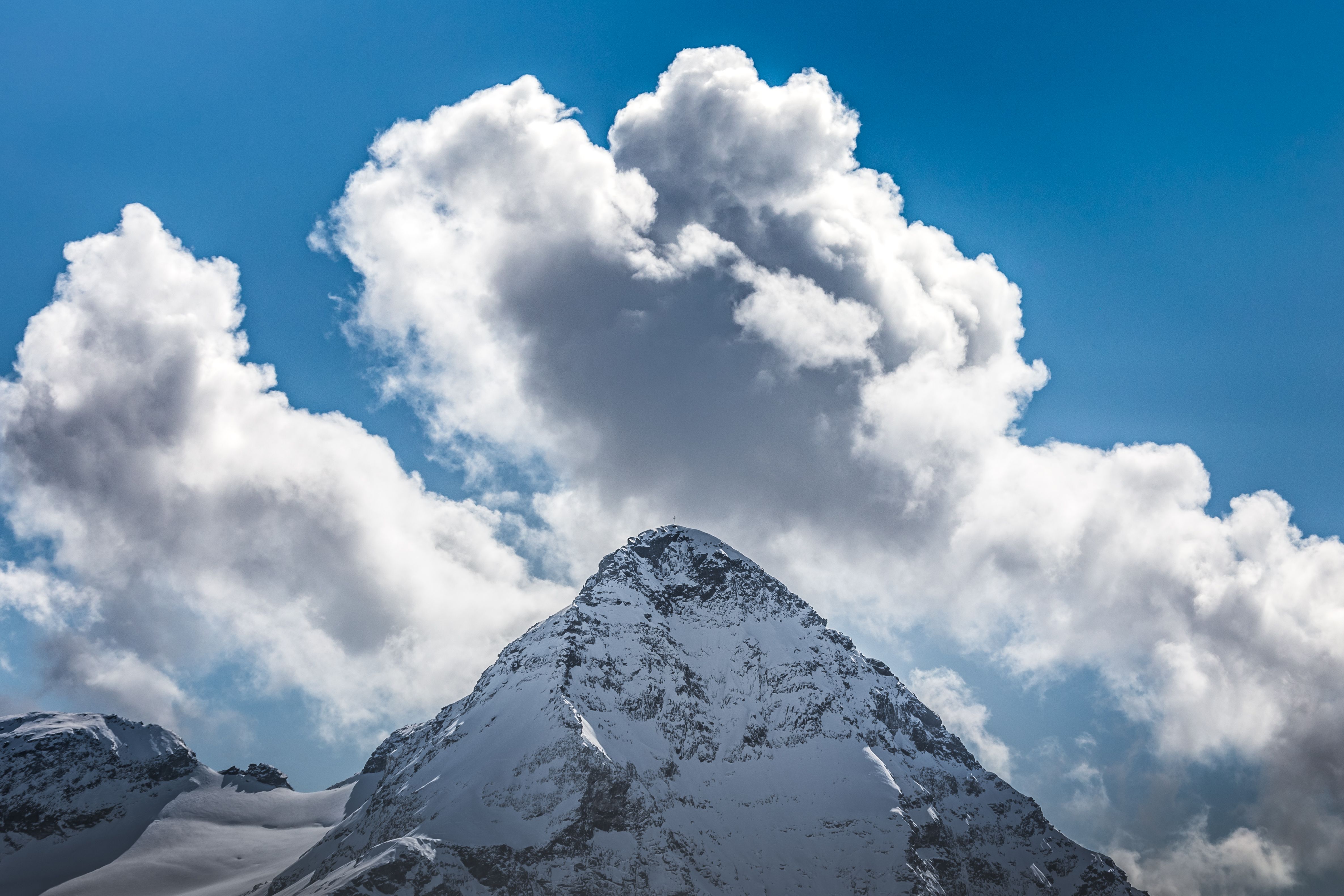 White Clouds over Snow Covered Mountain · Free Stock Photo