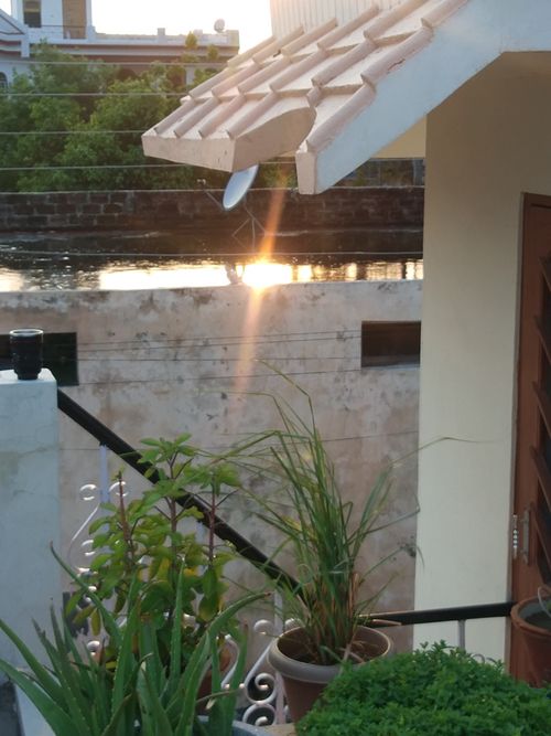 Free stock photo of sun on roof Stock Photo
