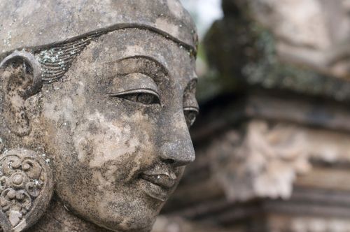 Free Detailed close-up of a Hindu stone sculpture in Ubud, showcasing traditional Balinese artistry. Stock Photo
