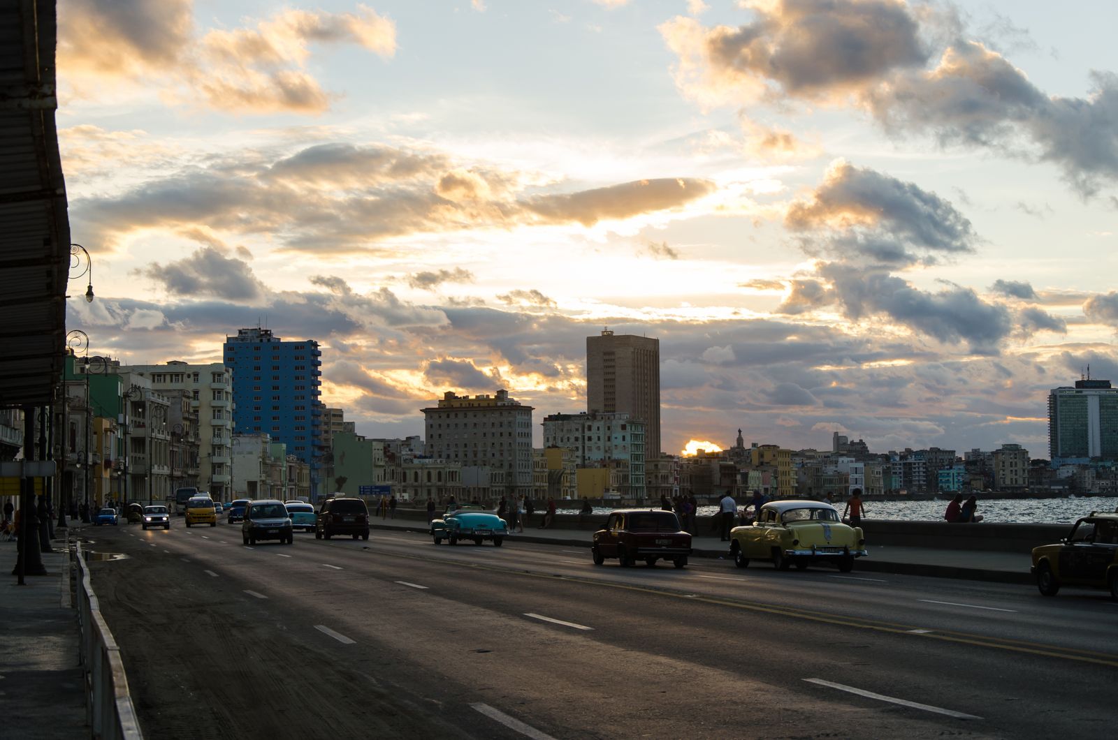 Classic cars on Havana's Malecón at sunset
