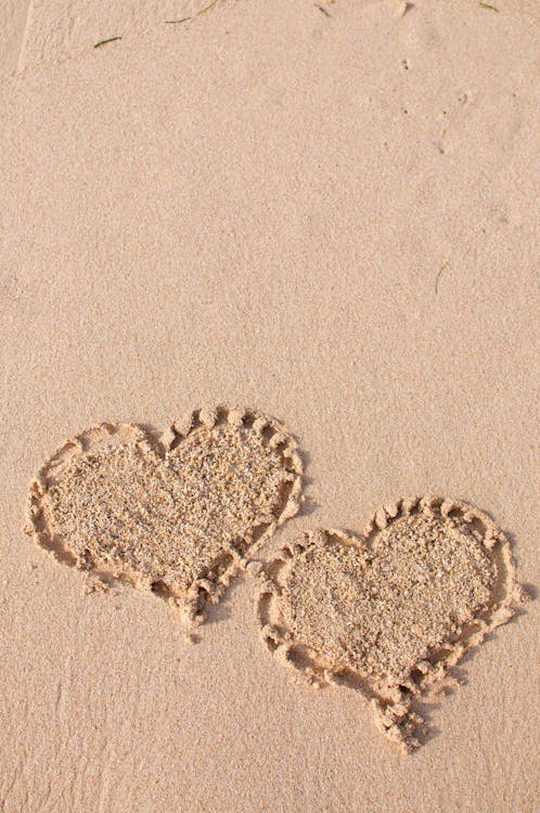 Free Heart Shaped Sand on Beach Stock Photo