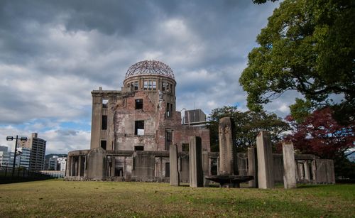 Free The iconic Hiroshima Peace Memorial Dome against a cloudy sky in Hiroshima, Japan. Stock Photo