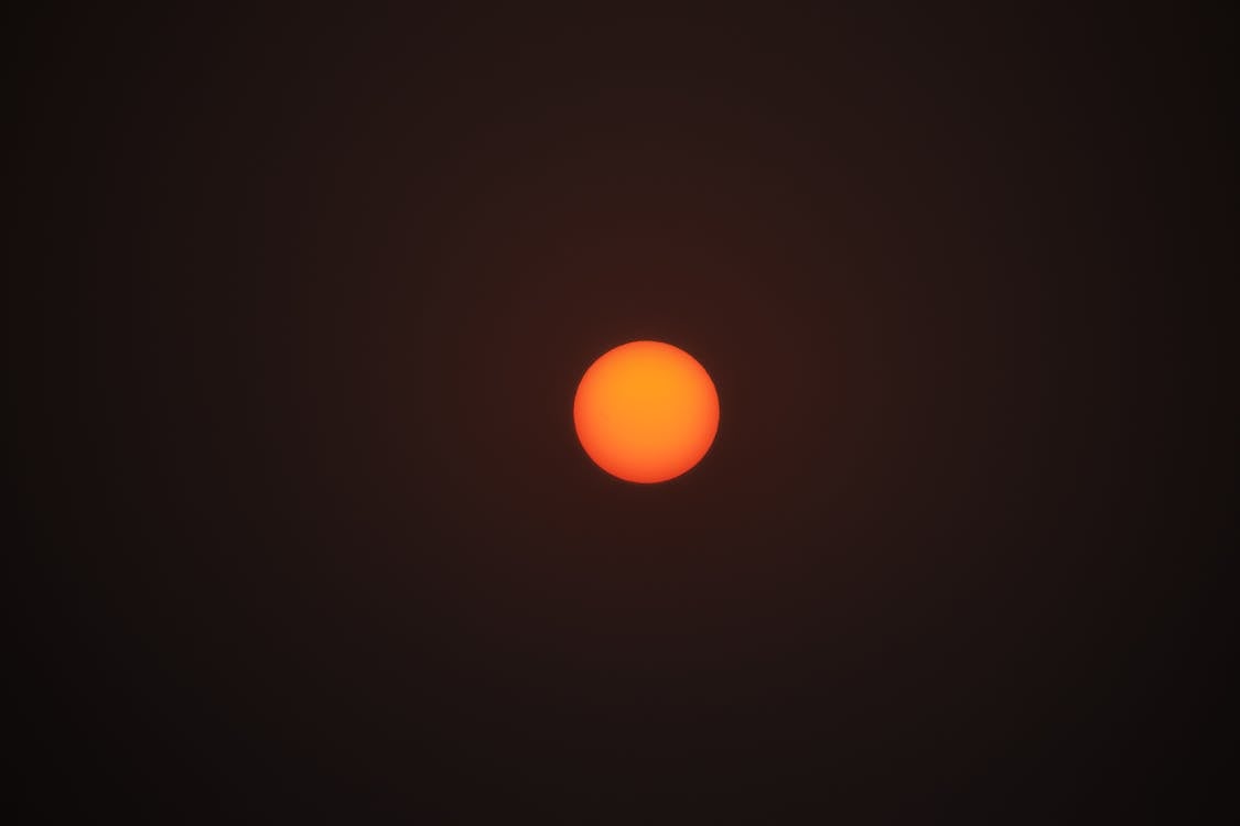 Red Sun in Black Background · Free Stock Photo