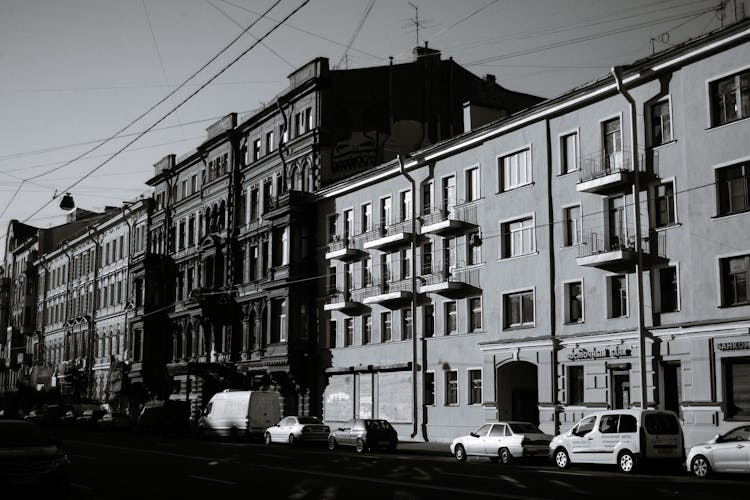 Road With Parked Cars Located In Russian City