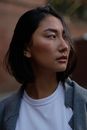 Girl in White Crew Neck Shirt and Gray Cardigan